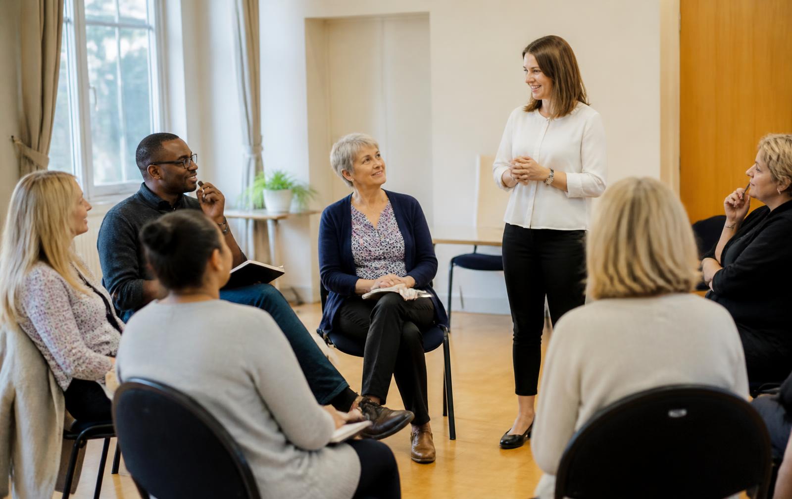 Small group training session for care professionals in a community hall